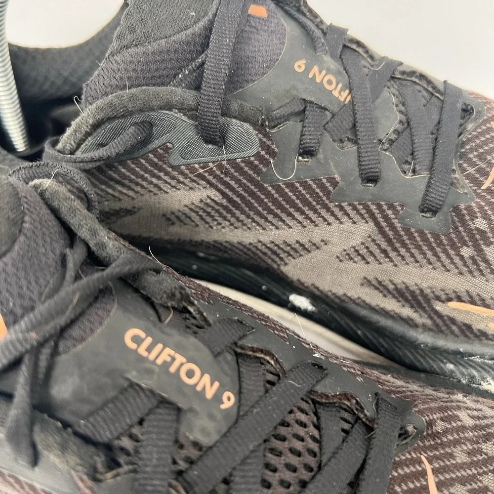 HOKA One One Clifton 9 Black Gold 9.5 B Womens Lace Up Running Shoes Sneakers